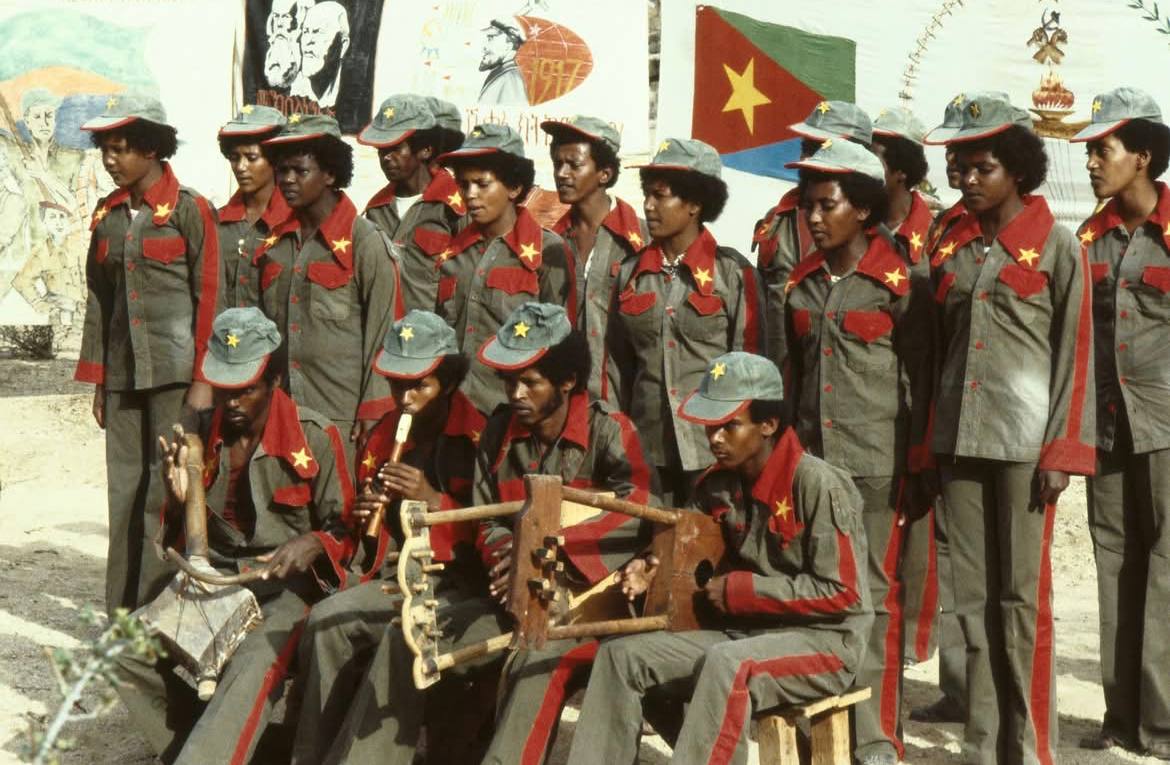 EPLF fighters playing music and performing dances in Afabet, 1980